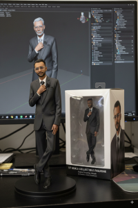 A realistic PVC-style figurine of man placed on a round display base.